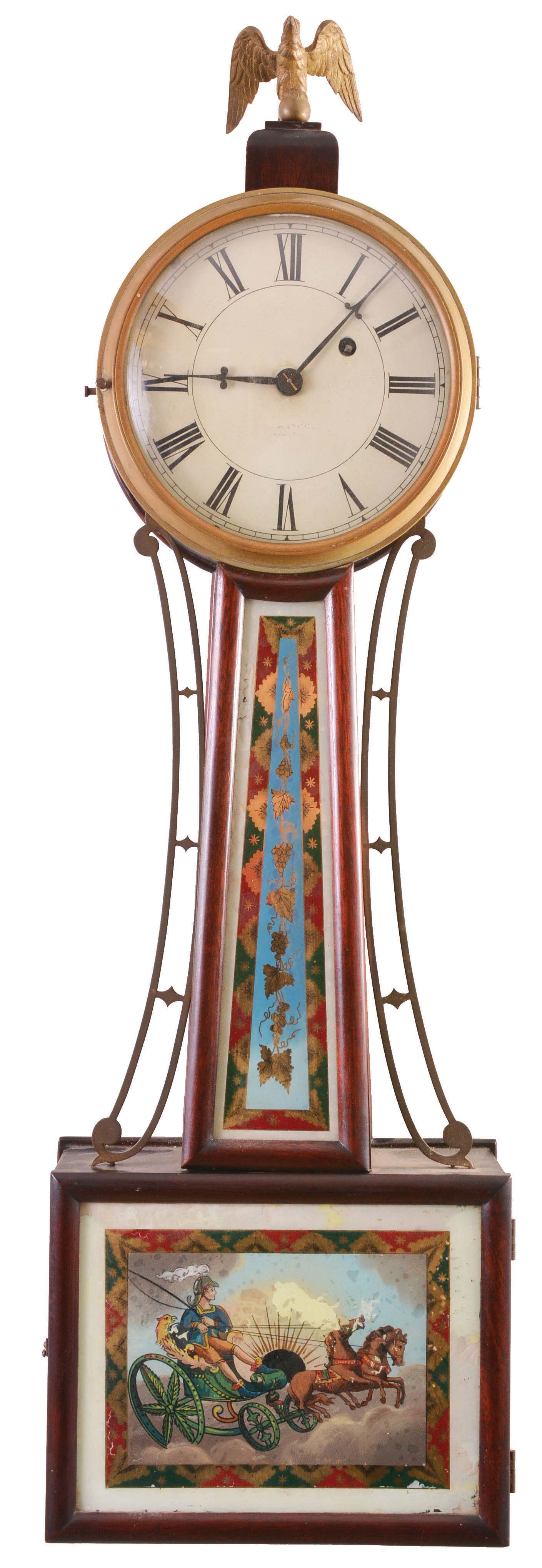 Herschede Clock Co., Cincinnati, Ohio, banjo clock retailed by Tiffany &amp; Co., New York, 8 day, time only, weight driven movement in a mahogany case with a painted metal dial and reverse painted throat and lower tablets — Antique Clocks Price Guide