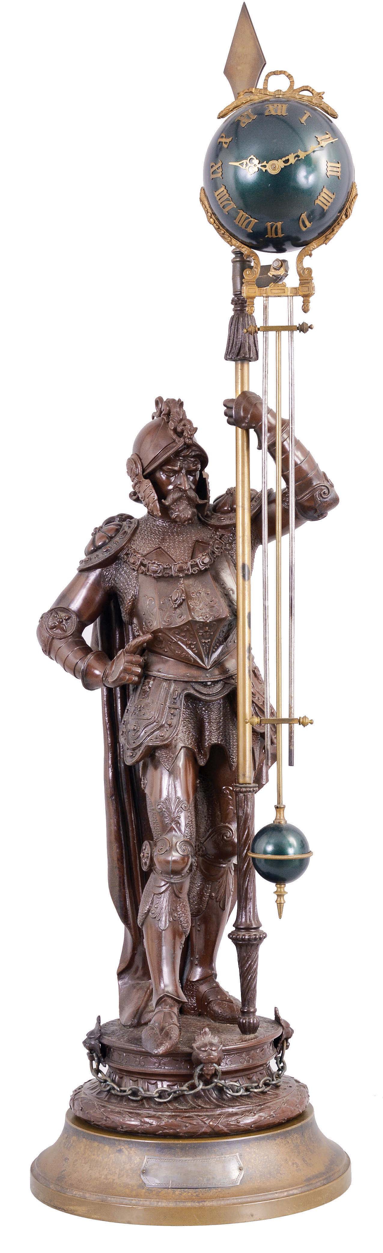 France, large swinging arm shelf clock with 8 day, time only, spring driven movement in a ball form swinging arm case signed "BOCHER FRANCE", and mounted on bronzed white metal figure of medieval soldier bearing a lance resting on heavy round brass pedestal — Antique Clocks Price Guide