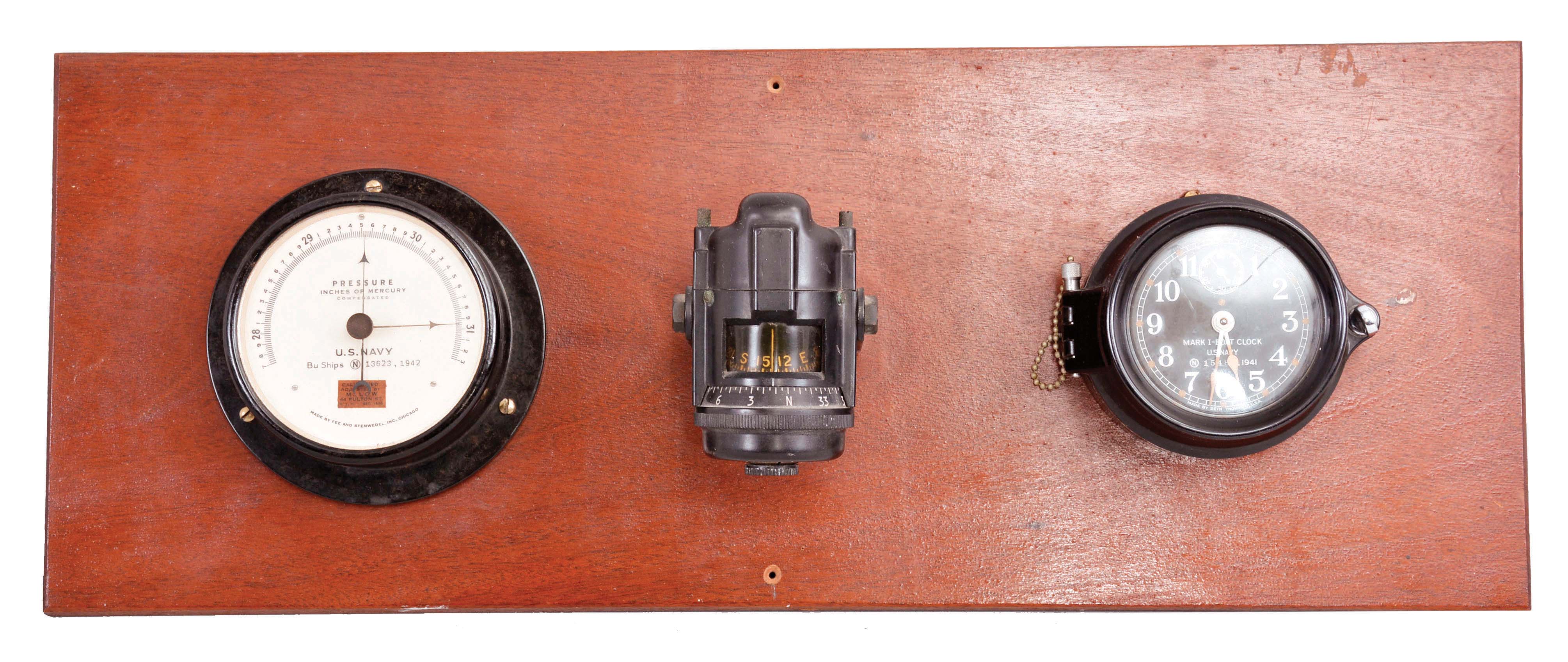 Seth Thomas Clock Co., Thomaston, Conn., "Mark-I Boat Clock", 8 day, time only, spring driven movement with rear wind in a black phenolic case with 3.5 inch black dial reading "U.S. Navy / 15485, 1941". The clock is mounted to a mahogany board with a barometer made by Fee &amp; Stemwedel, dated 1942 and a compass made by Sherrill Research Corporation. — Antique Clocks Price Guide