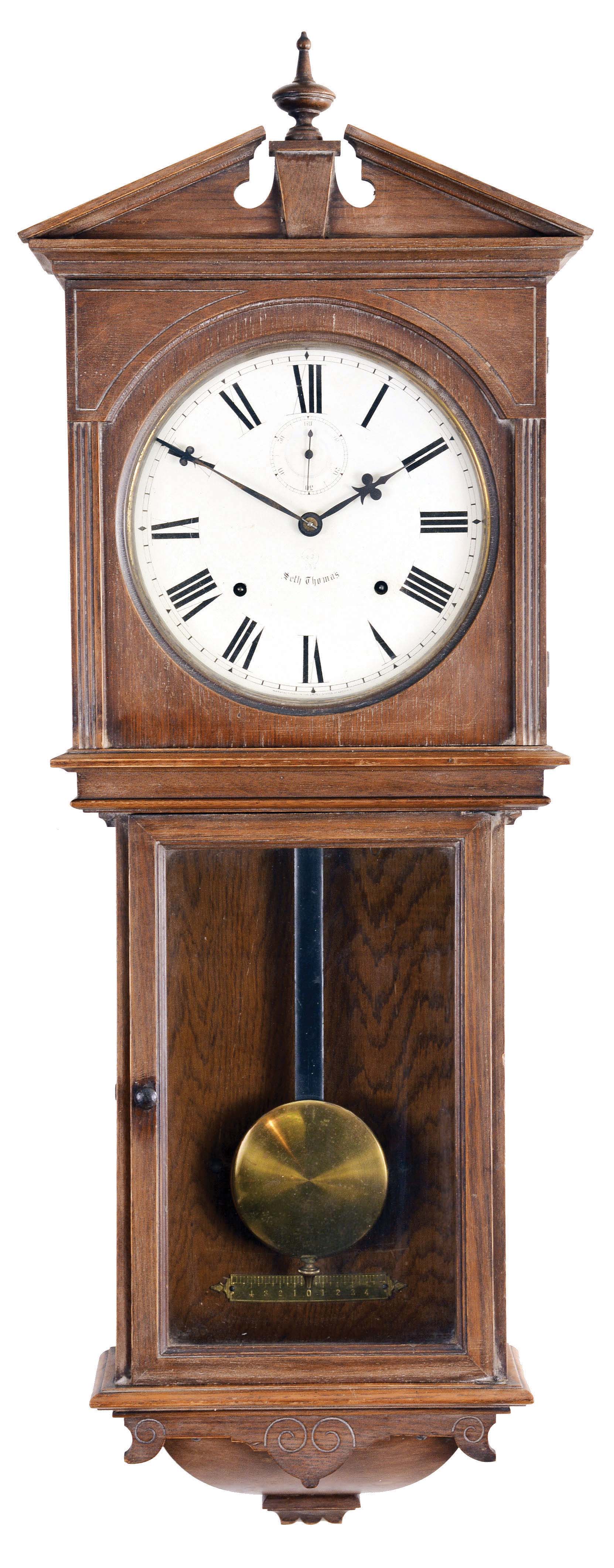 Seth Thomas Clock Co., Thomaston, Conn., "Umbria" hanging wall clock with a spring driven, 8 day, time and strike movement in an oak case. — Antique Clocks Price Guide