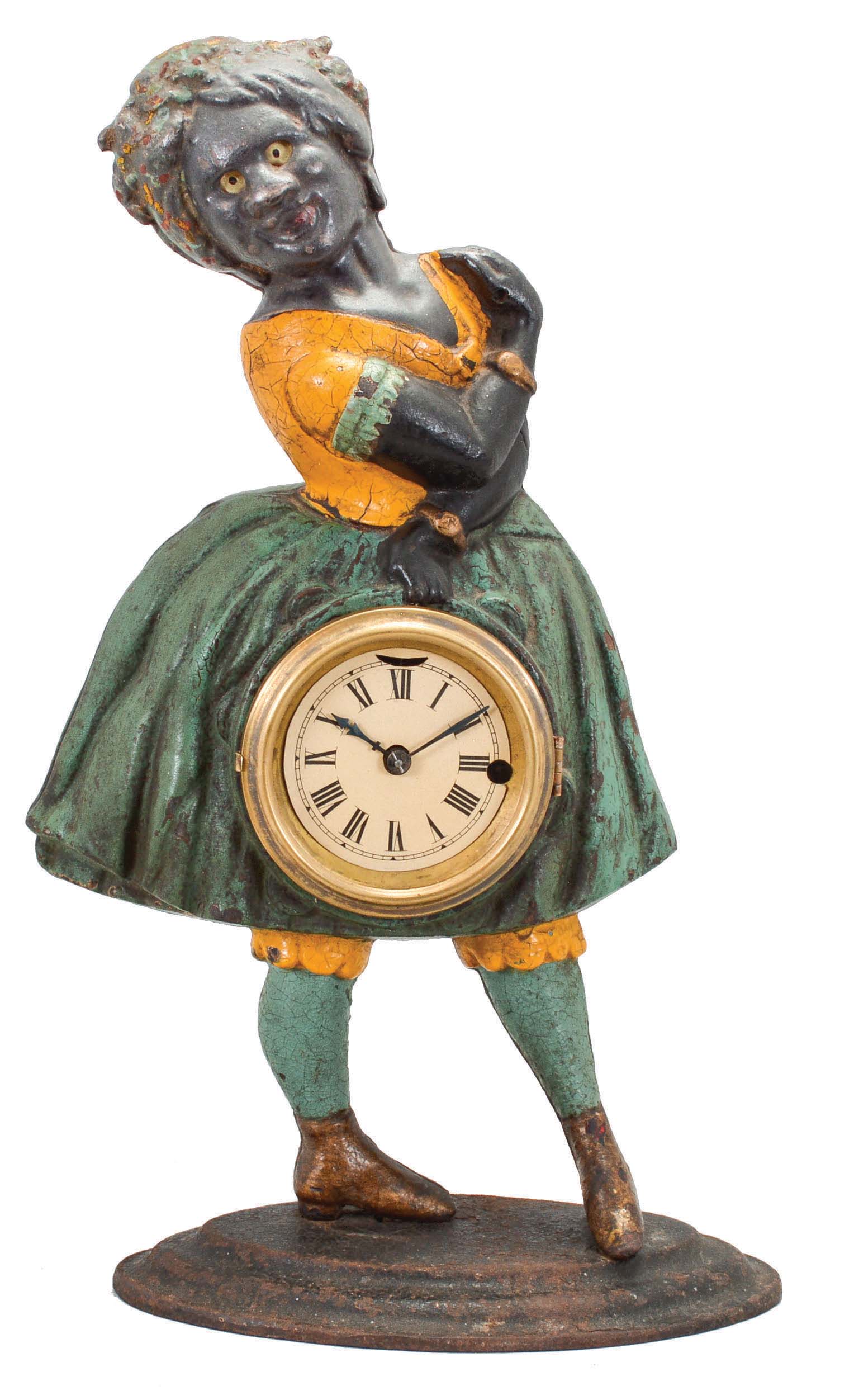Bradley &amp; Hubbard, Meriden, Conn., "Topsey" blinking eye shelf clock with a spring driven, 30 hour, timepiece with a balance wheel escapement in a painted cast iron case. — Antique Clocks Price Guide