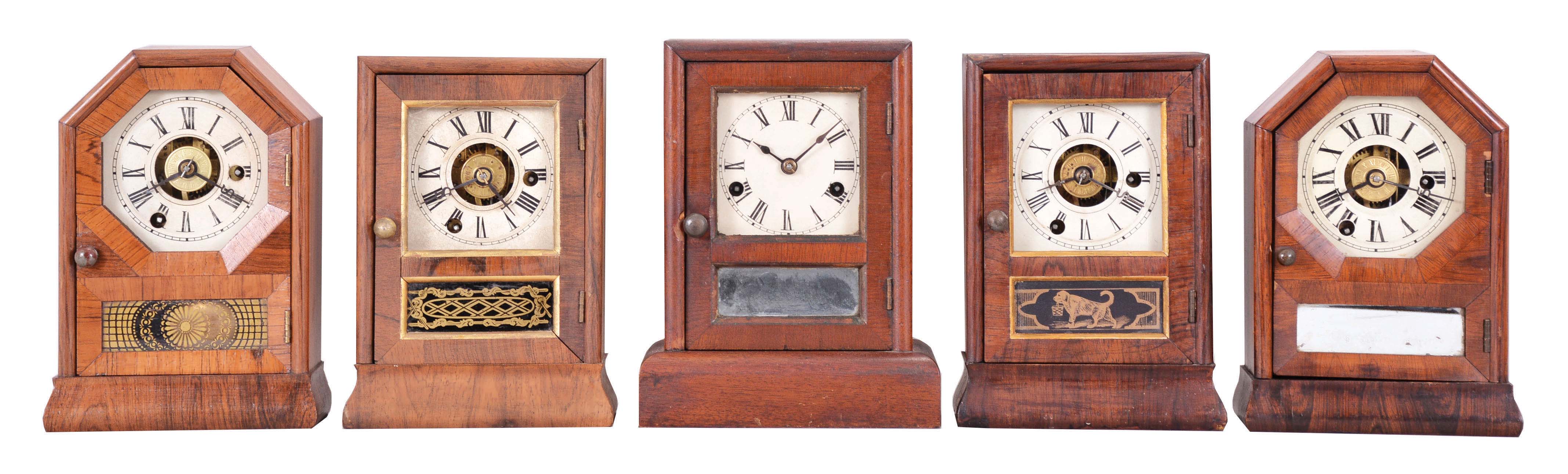 Clocks- 5 (Five): (1) Seth Thomas Clock Co., Plymouth Hollow, Conn., cottage shelf clock with a spring driven, 30 hour, time and alarm movement in a rosewood veneered case, c1865. (2) Seth Thomas Clock Co., Plymouth Hollow, Conn., cottage shelf clock with a spring driven, 30 hour, time and alarm movement in a rosewood veneered case, c1865. (3) Seth Thomas Clock Co., Plymouth Hollow, Conn., cottage shelf clock with a spring driven, 30 hour, time and alarm movement in a rosewood veneered case, c1865. (4) Seth Thomas Clock Co., Thomaston, Conn., cottage shelf clock with a spring driven, 30 hour, time and strike movement in a rosewood veneered case, c1875. (5) Seth Thomas Clock Co., Plymouth Hollow, Conn., cottage shelf clock with a spring driven, 30 hour, time and alarm movement in a rosewood veneered case, c1865 — Antique Clocks Price Guide