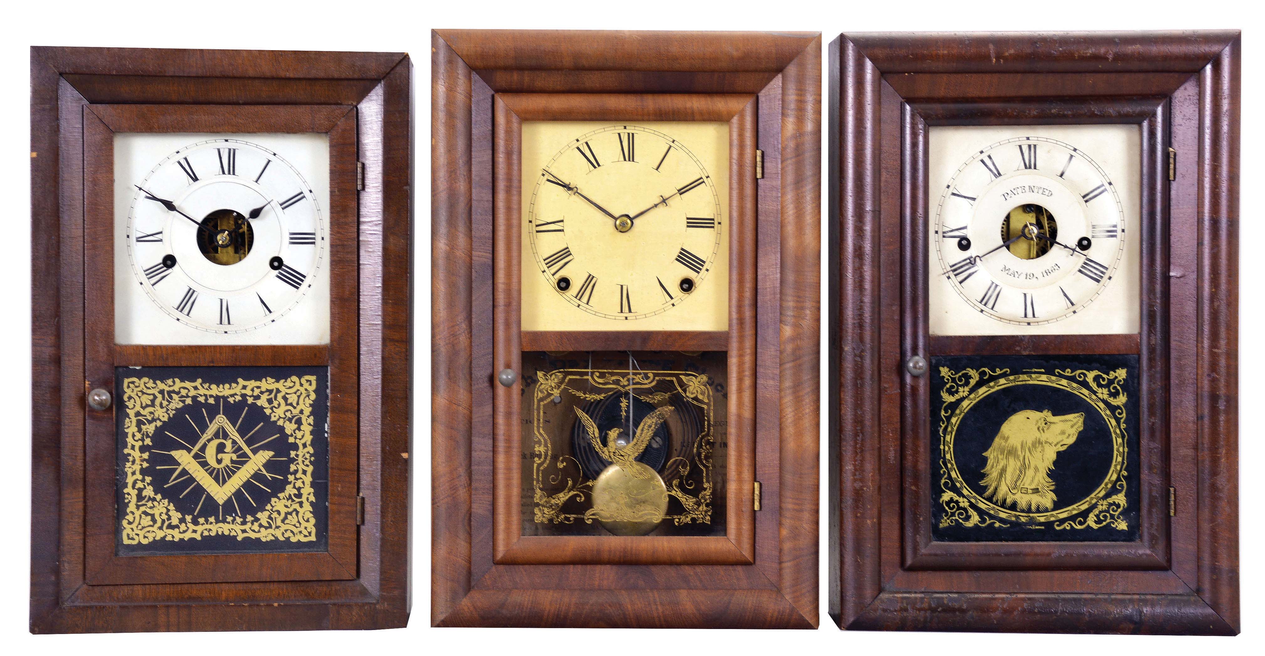 Clocks- 3 (Three): (1) Seth Thomas Clock Co., Thomaston, Conn., 30 hour, time and strike, spring brass movement "Kitchen" model bevel case shelf clock, c.1870 (2) Seth Thomas Clock Co., Thomaston, Conn., 8 day, time and strike, spring brass movement "Round Band" shelf clock, c.1870. (3) Seth Thomas Clock Co., Thomaston, Conn., 30 hour, time and strike, spring brass movement "Round Band" shelf clock, c.1870. — Antique Clocks Price Guide