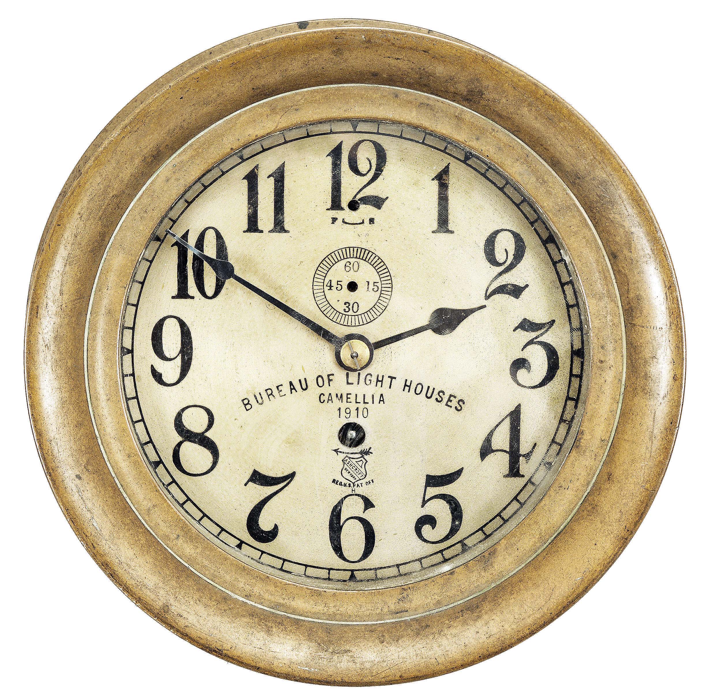 E. Howard &amp; Co., Boston, Mass., for Ashcroft, New York, marine lever, 8 day, time only, spring-driven movement with jeweled lever escapement in brass case with hinged bezel, 6.5 inch silvered dial inscribed with "Bureau of Lighthouses / Camellia / 1910", subsidiary seconds, black spade hands, movement serial number 1755. — Antique Clocks Price Guide