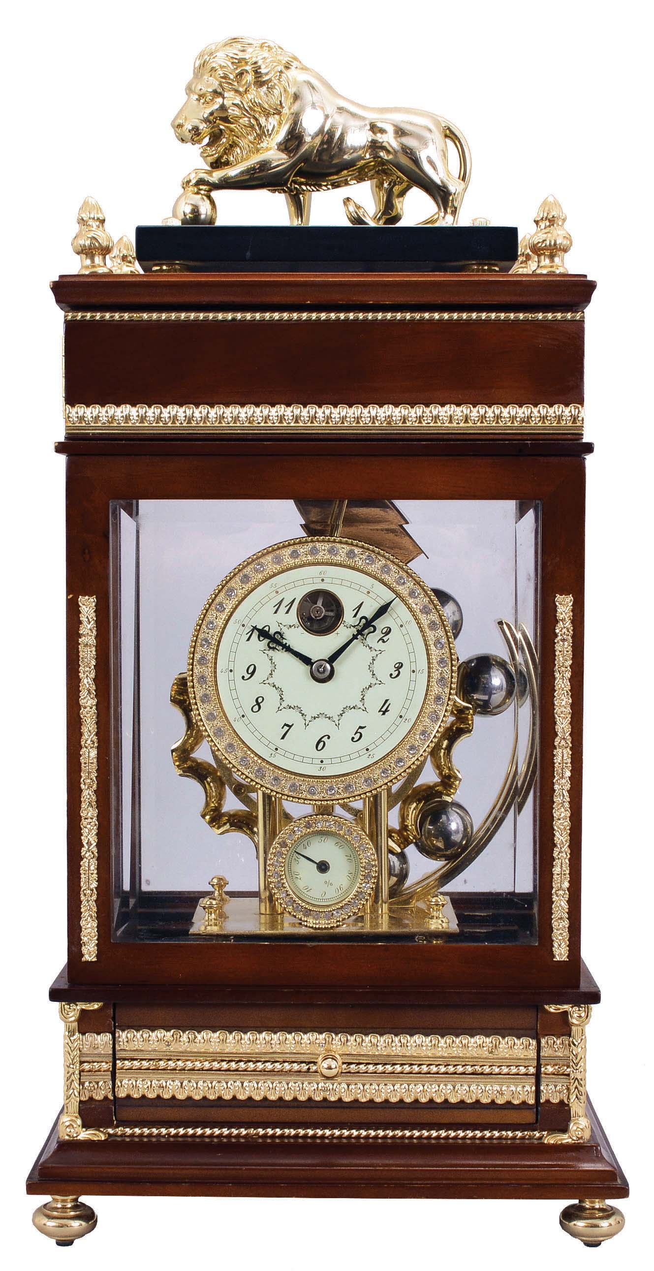 Chinese reproduction of a Ferris Wheel falling ball gravity mystery timepiece. The balls move down an inclined plain through the top of clock on the Ferris wheel and supply weight to run the clock. The balls exit the case and fall into a draw below to be placed on the rack to keep the clock going. — Antique Clocks Price Guide