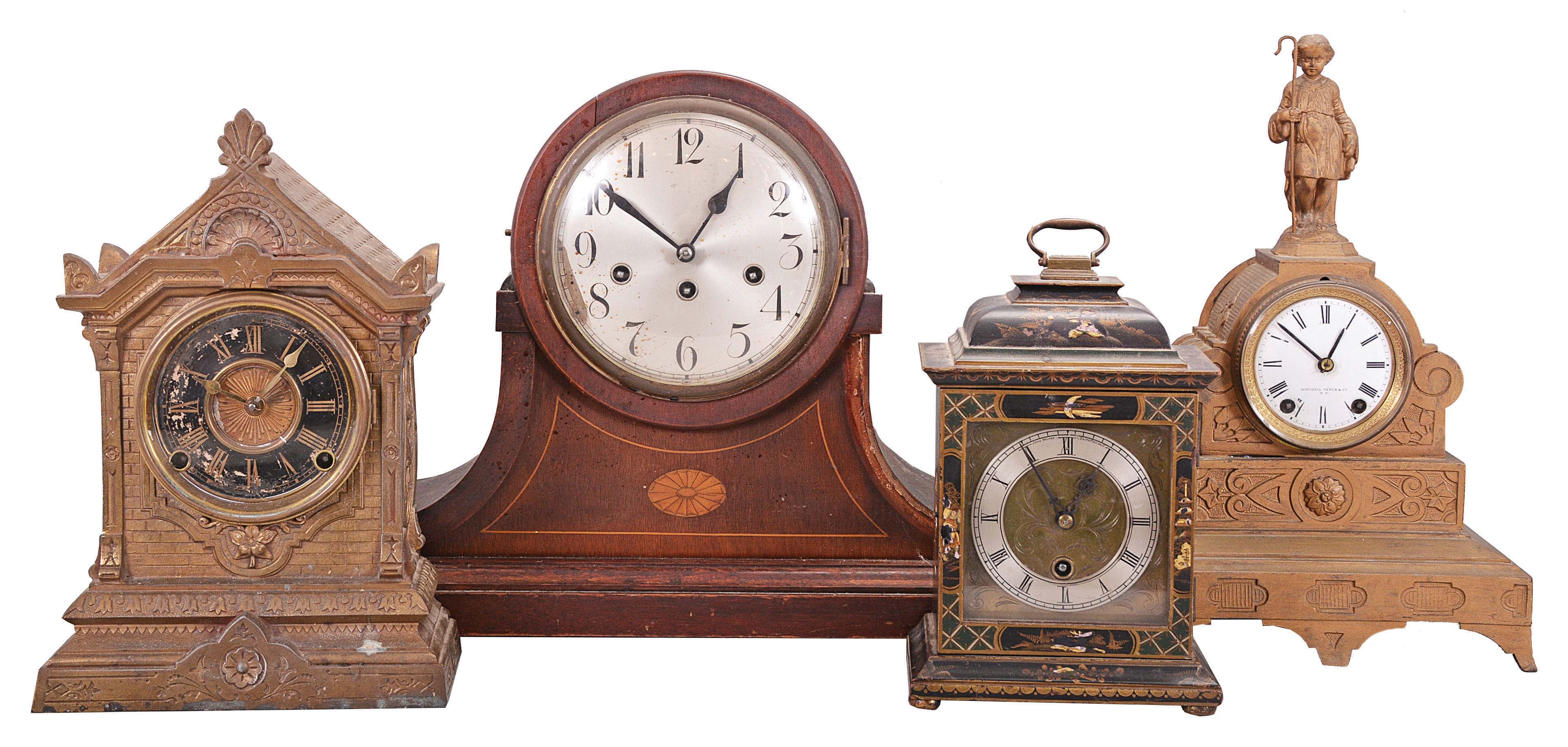 Clocks- 5 (Five): (1) Nicholas Mueller Sons, "Chapel", 8 day, time and strike, spring brass movement mantel clock, c1875 (2) Mitchell Vance &amp; Co., New York, with a Seth Thomas' Sons &amp; Co., New York, (No. 8025) movement, 15 day, time and strike, spring brass movement figural mantel clock, c1872, Mitchell Vance made the cases for S. Thomas &amp; Sons. (3) English Watch &amp; Clock Co., Coventry, England. Astral, 8 day, lever movement miniature English bracket clock, c1903 (4) Junghans, Germany, 8 day, time and strike, spring brass Westminster movement tambour shelf clock, c1900. (5) Ephraim Downes, Bristol Conn., pillar and scroll shelf clock, 30 hour, time and strike, weight driven movement in a mahogany and mahogany veneered case with painted wood dial. — Antique Clocks Price Guide