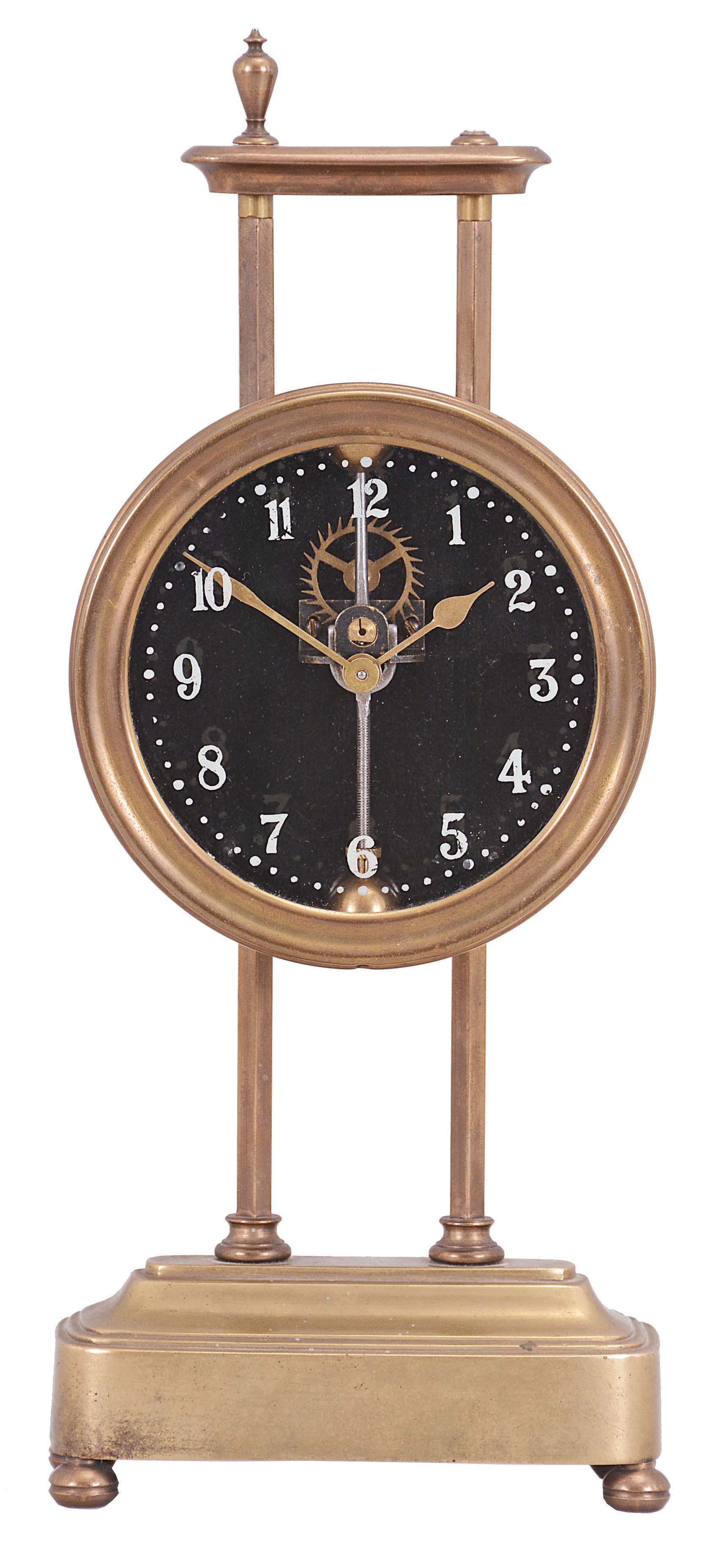 England, gravity clock, 30 hour, time only, weight driven movement with visible escapement and compound pendulum, in a brass case, glass dial with reverse painted Arabic figures, molded base on bun feet, hexagonal columns, and molded cornice with brass finials. — Antique Clocks Price Guide