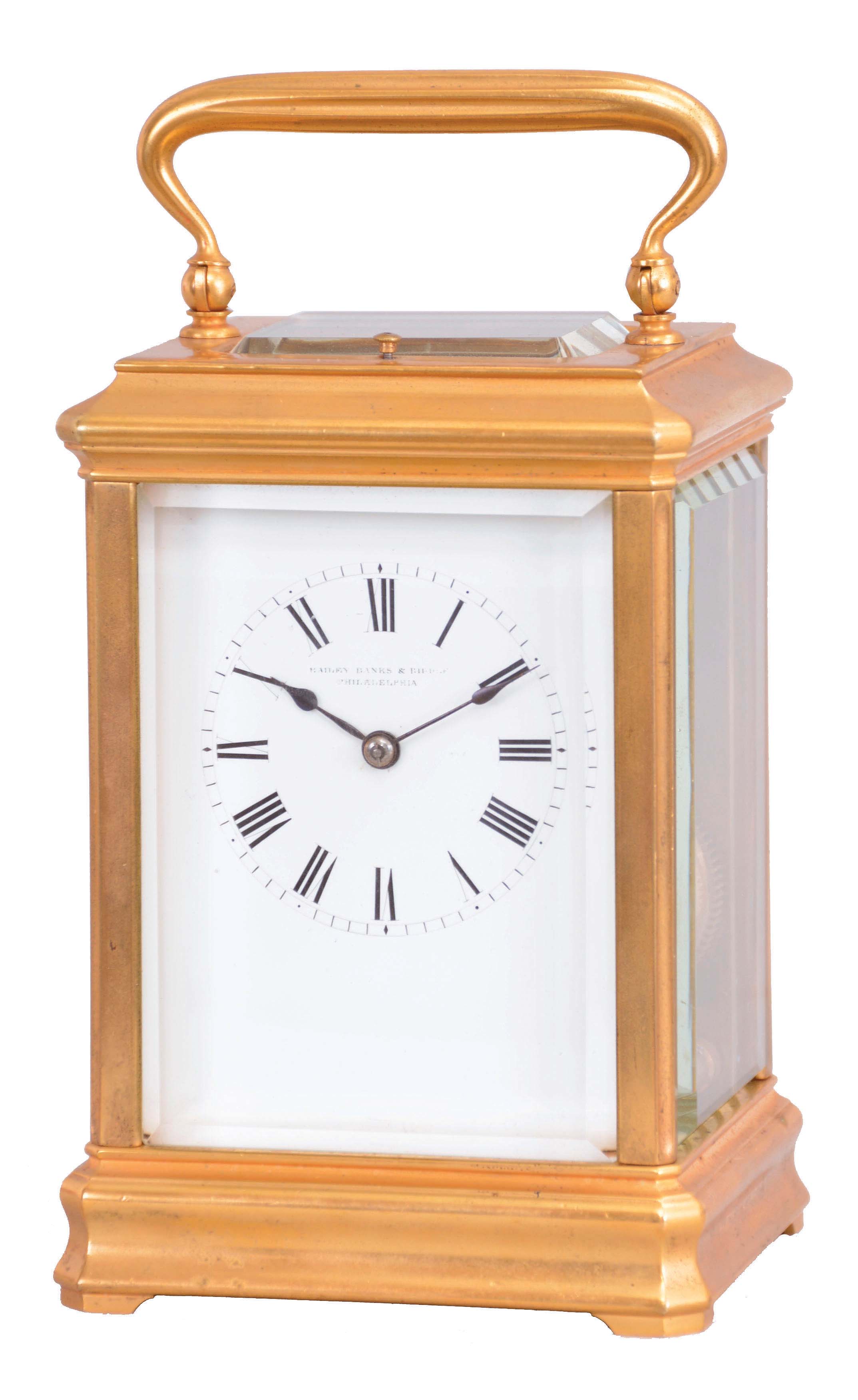 France, for Bailey, Banks, and Biddle, Philadelphia, a gilt, Cannelee variant cased hour repeating carriage clock, the glazed case with molded base and cornice, top with carrying handle, Roman numeral white enamel dial, blued steel spade hands, 8 day, two train movement with lever platform, striking the hours and half hour in passing, and repeating the last hour on demand — Antique Clocks Price Guide
