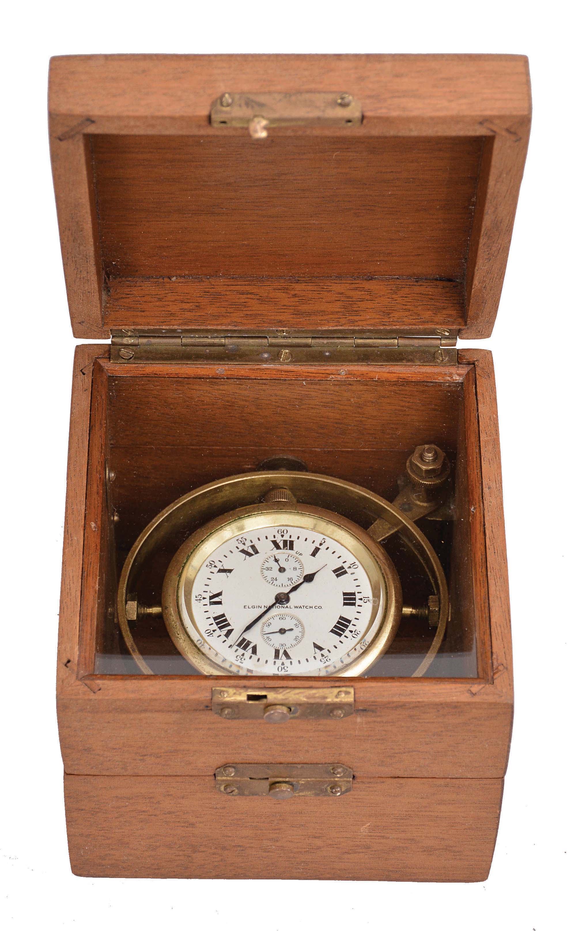 Deck watch with box, Elgin Watch Co., "Father Time", grade 367, 18 size, freesprung, 21 jewel damascened nickel movement with cut bimetallic Guillaume balance and gold jewel settings, 35 size, Roman numeral, double sunk white enamel dial, blued steel spade and poker hands, contained in a gimbaled brass bowl, with three tier mahogany box, serial #21869472, c1920 — Antique Clocks Price Guide