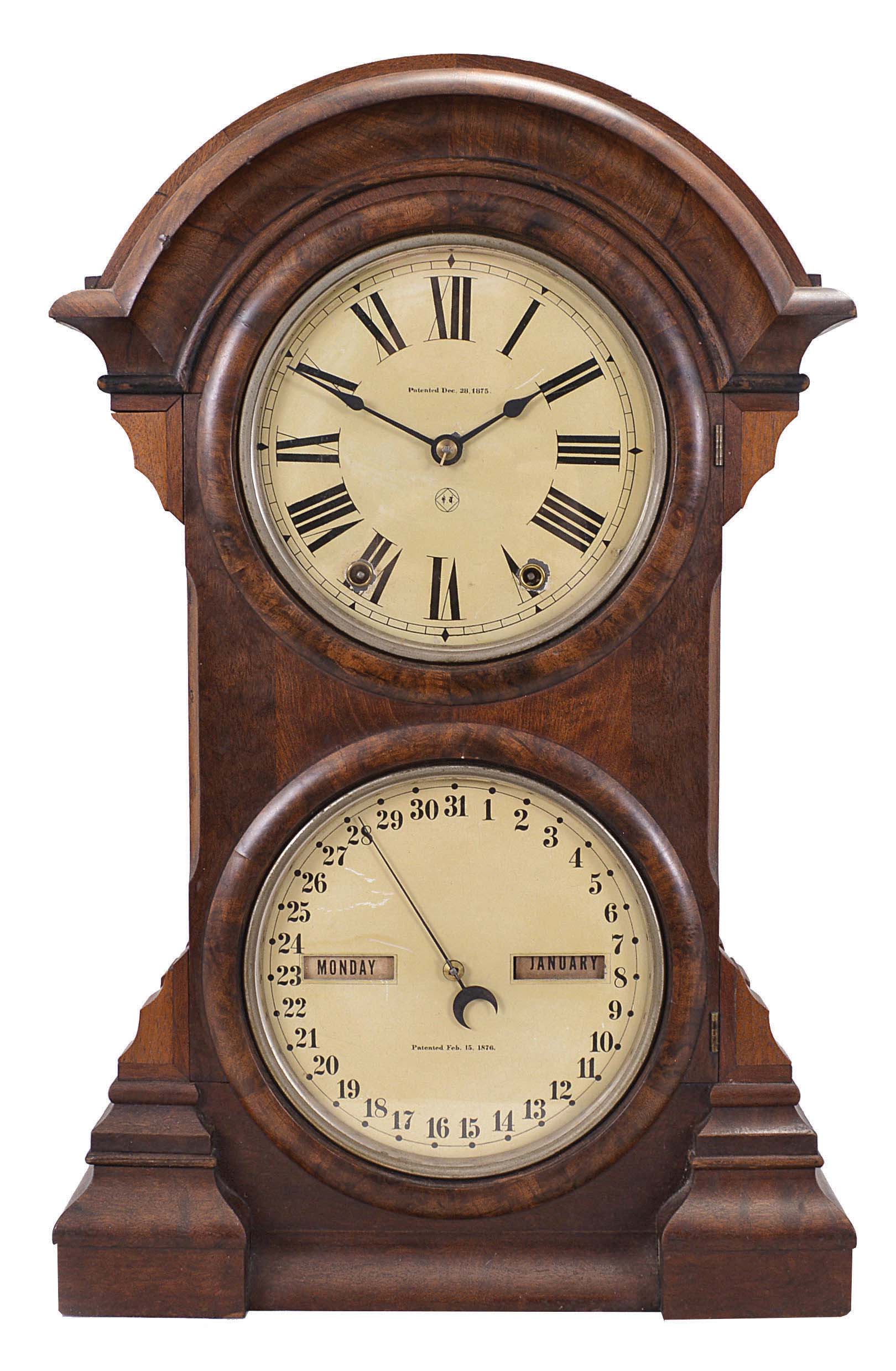 Seth Thomas Clock Co., Thomaston, Conn., "Parlor Calendar No. 4" shelf clock with a spring driven, 8 day, time and strike movement and an R. T. Andrews patented perpetual calendar mechanism in a walnut case with burl accents. — Antique Clocks Price Guide