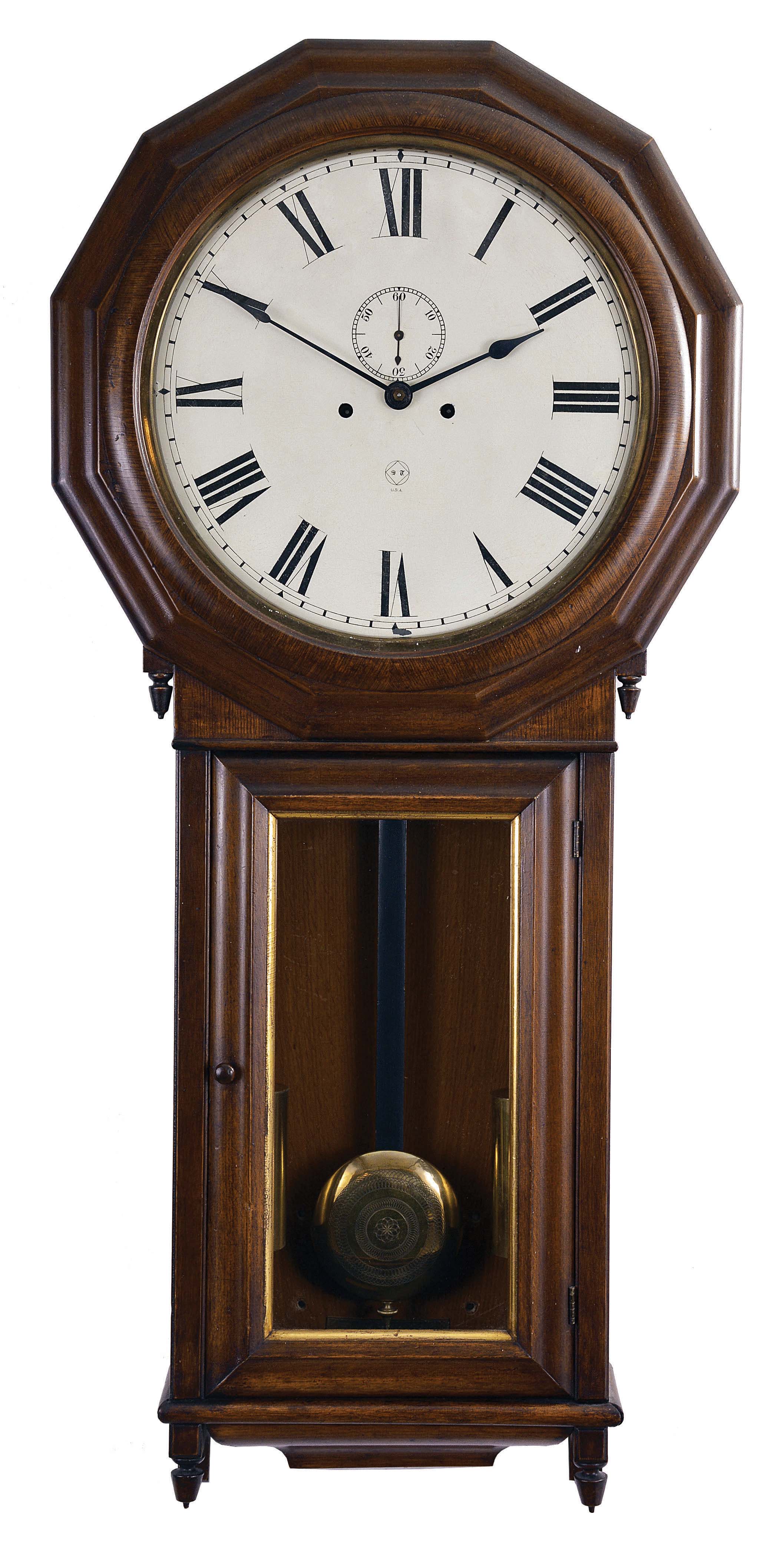 Seth Thomas Clock Co., Thomaston, Conn., "Regulator No. 3" hanging clock with a weight driven, 8 day, time and strike movement in an oak veneered case. — Antique Clocks Price Guide