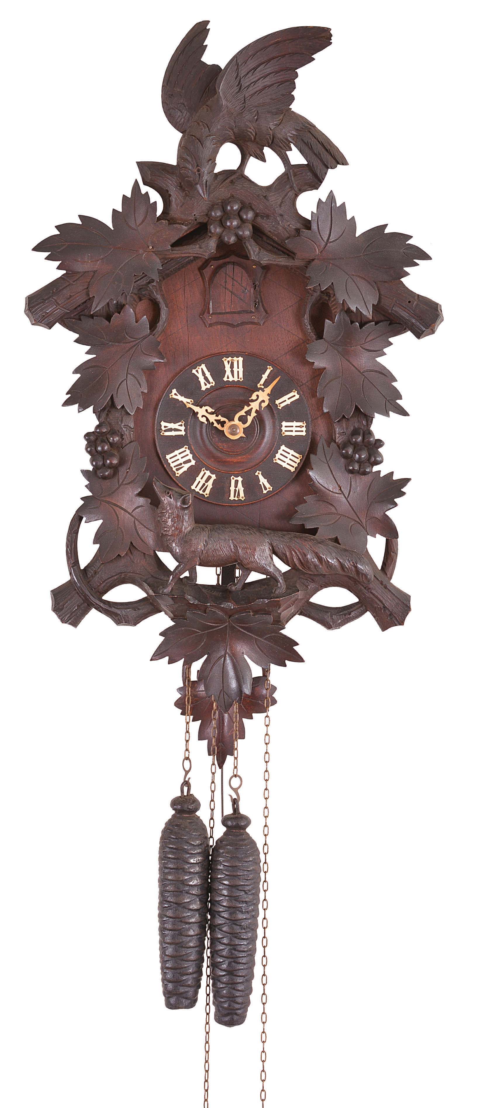 American Cuckoo Clock Co., Philadelphia, Penn., cuckoo wall clock with German 30 hour, time and gong strike with animated cuckoo bird, weight driven brass movement in a wood case featuring leaves, a prominent bird on top, and fox carved in the round after the grapes, a painted wood cuckoo bird with articulated beak and wings, and the dial with bone hands. — Antique Clocks Price Guide