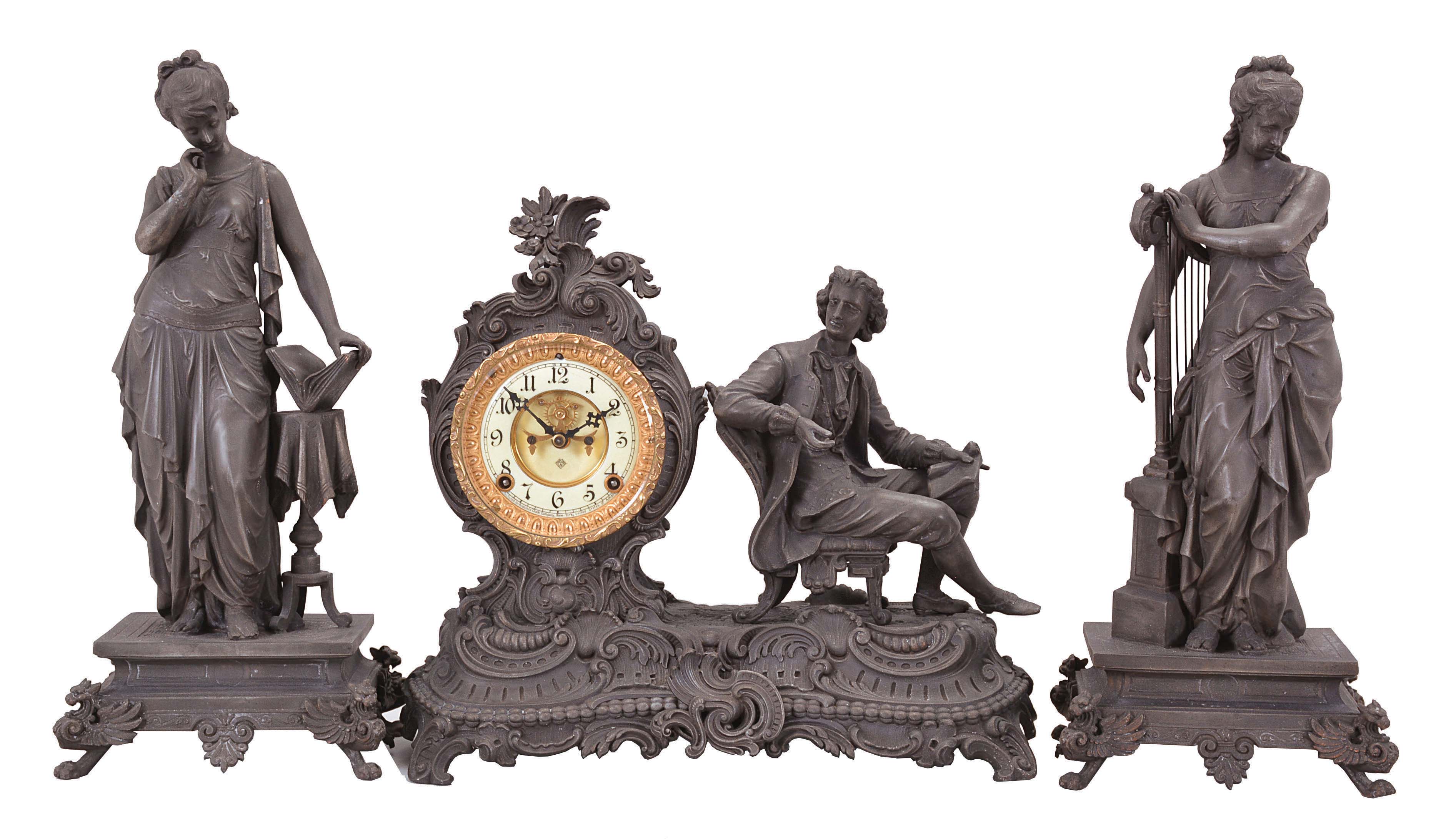 Ansonia Clock Co., New York, "Mozart" 8 day, time and strike, spring brass movement figural mantel clock. Also included are individual spelter figures of Poetry and Music. — Antique Clocks Price Guide