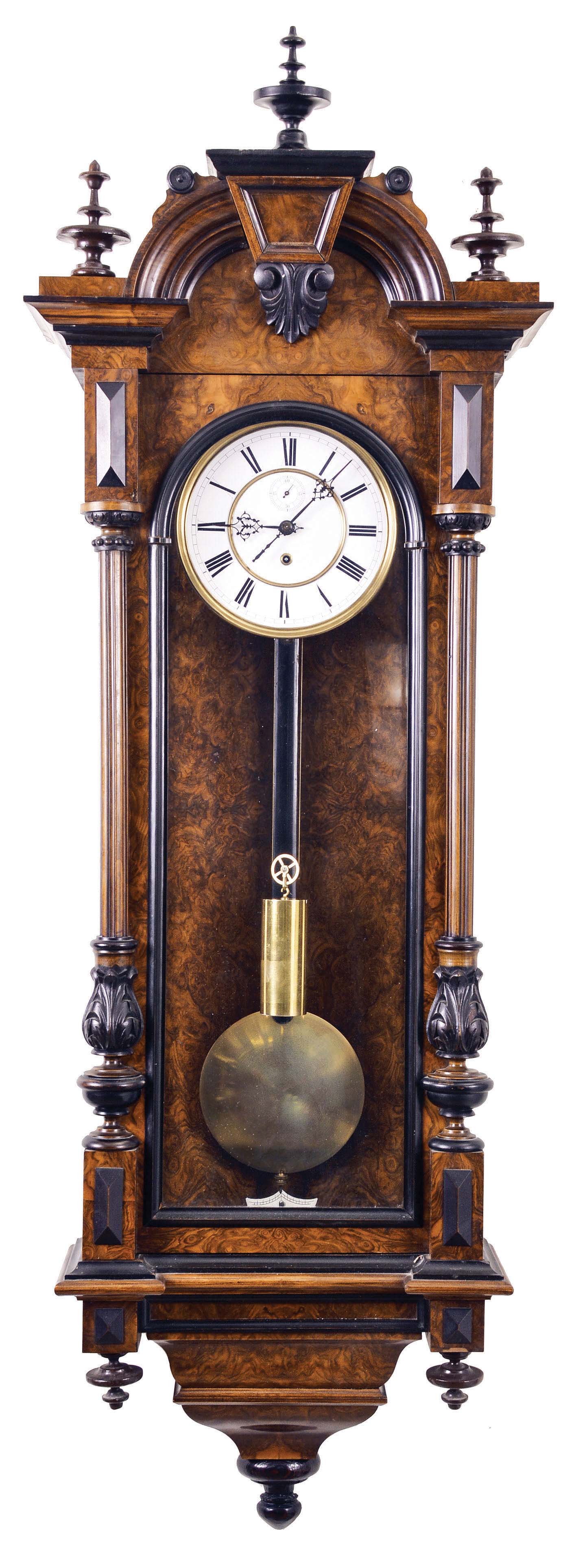 Lenzkirch Clock Co., Lenzkirch, Germany, Vienna style wall clock, 8 day, time only, brass weight driven movement in a burled walnut carved case with ebonized highlights, white enamel dial and subsidiary seconds, serial #552447 — Antique Clocks Price Guide
