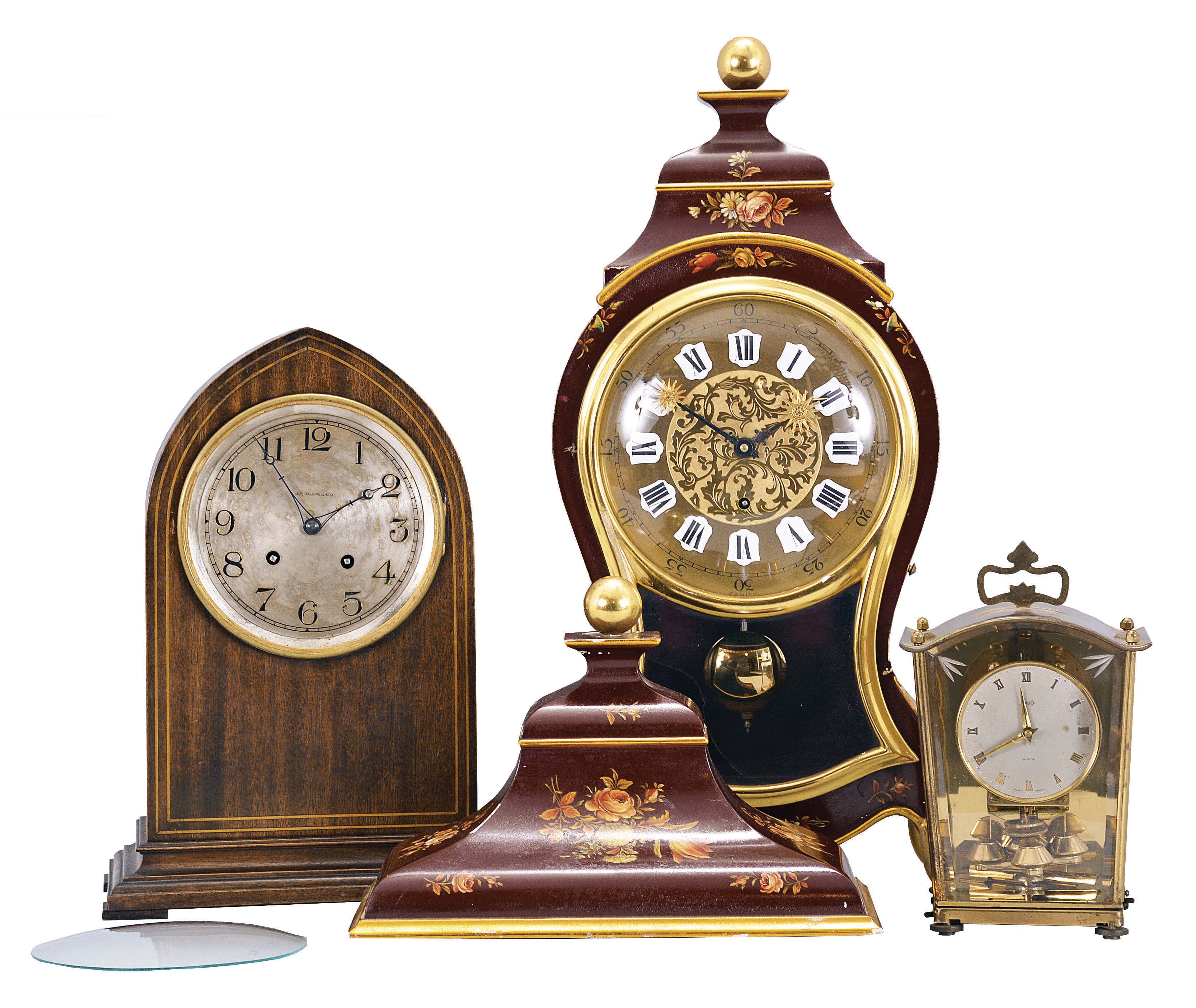 Clocks- 3 (Three) Mantel: (1) Zenith, Le Locle, Switzerland, reproduction Neuchatel bracket clock, 8 day, time and strike, tandem spring driven movement in a floral decorated painted wood case. (2) Waltham Clock Co., Waltham, Mass., lancet mantel clock, 8 day, time and strike, spring driven balance wheel movement in a walnut case with silvered dial reading "J.E. Caldwell &amp; Co.". (3) Shatz, Germany, 400 day or anniversary clock, time only, spring driven movement with torsion pendulum in a brass and glass case. — Antique Clocks Price Guide