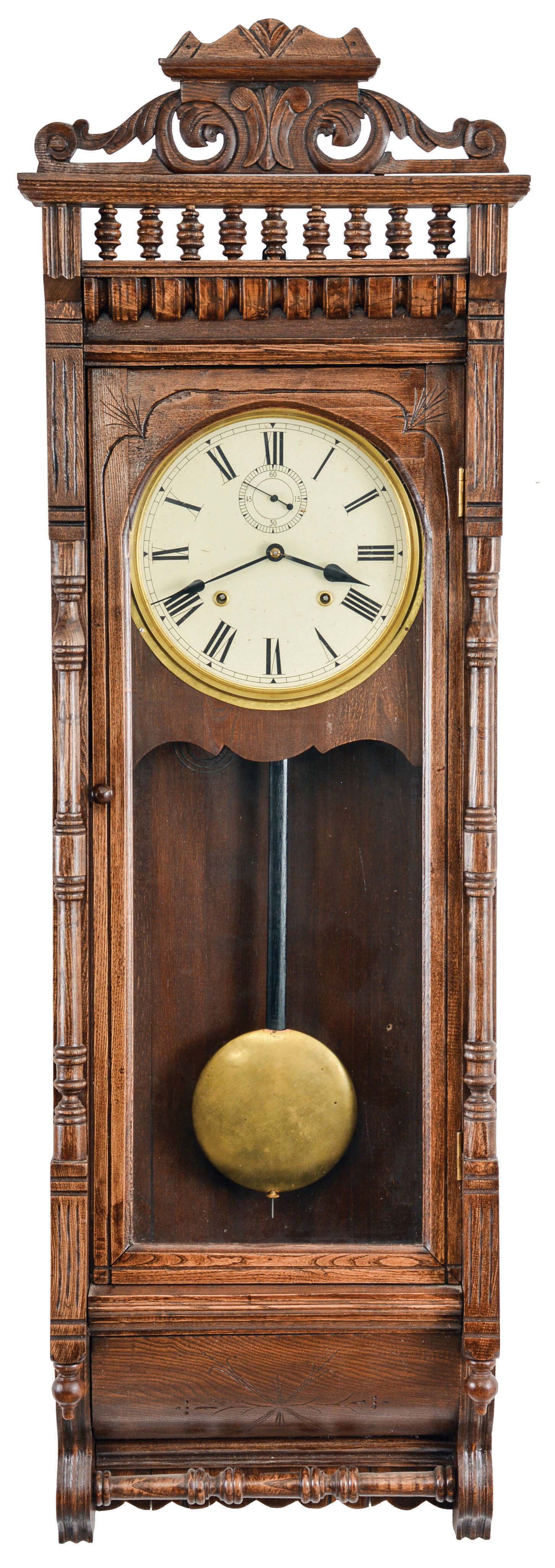 Reproduction of an Ansonia Clock Co., "Santa Fe", 8 day, time and strike, spring brass movement wall clock. This looks to be a Chinese copy of the original. — Antique Clocks Price Guide