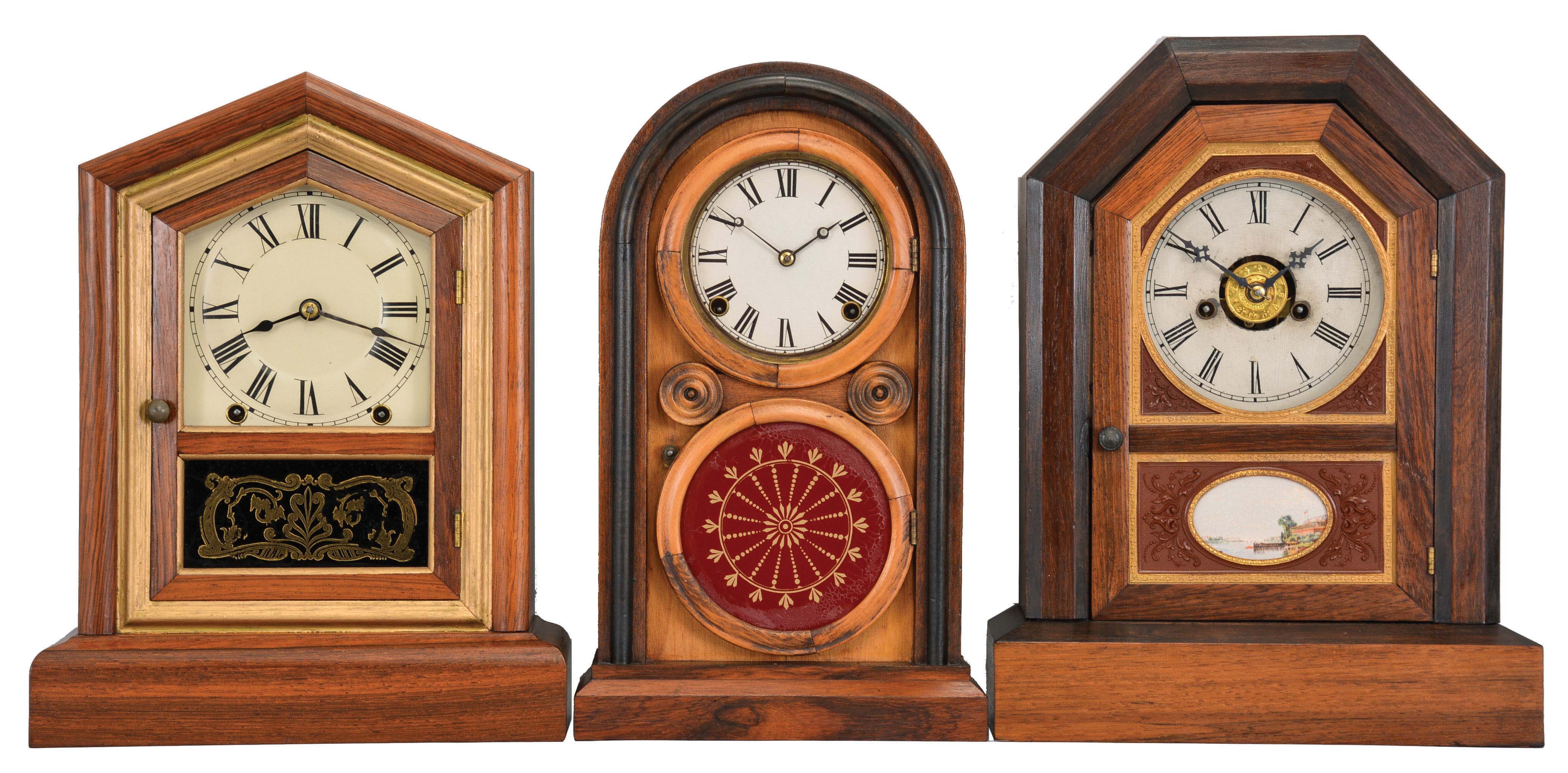 Clocks- 6 (Six): (1) Seth Thomas Clock Co., Thomaston, Conn., "Victoria" shelf clock with a spring driven, 8 day, time and strike movement in a rosewood veneered case, c1880. (2) Seth Thomas Clock Co., Thomaston, Conn., "Kitchen" shelf clock with a spring driven, 30 hour, time and strike movement in a mahogany veneered case, c1875. (3) Ingraham Clock Co., Bristol, Conn., "Venetian No. 3" shelf clock with spring driven, 8 day, time and strike movement in a mahogany veneered case, c1875. (4) Jerome &amp; Co., New Haven, Conn., shelf clock with a spring driven, 30 hour, time, strike and alarm movement in a rosewood veneered case with decorative gutta percha tablet, c1875. (5) E. N. Welch Mfg. Co., Forestville, Conn., "Thursby" shelf clock with a spring driven, 30 hour, time and strike movement in a walnut case, c1890. (6) Seth Thomas Clock Co., Thomaston, Conn., "Giant, No. 2" shelf clock with a spring driven, 8 day, time, strike and alarm movement in an oak case, c1904. — Antique Clocks Price Guide
