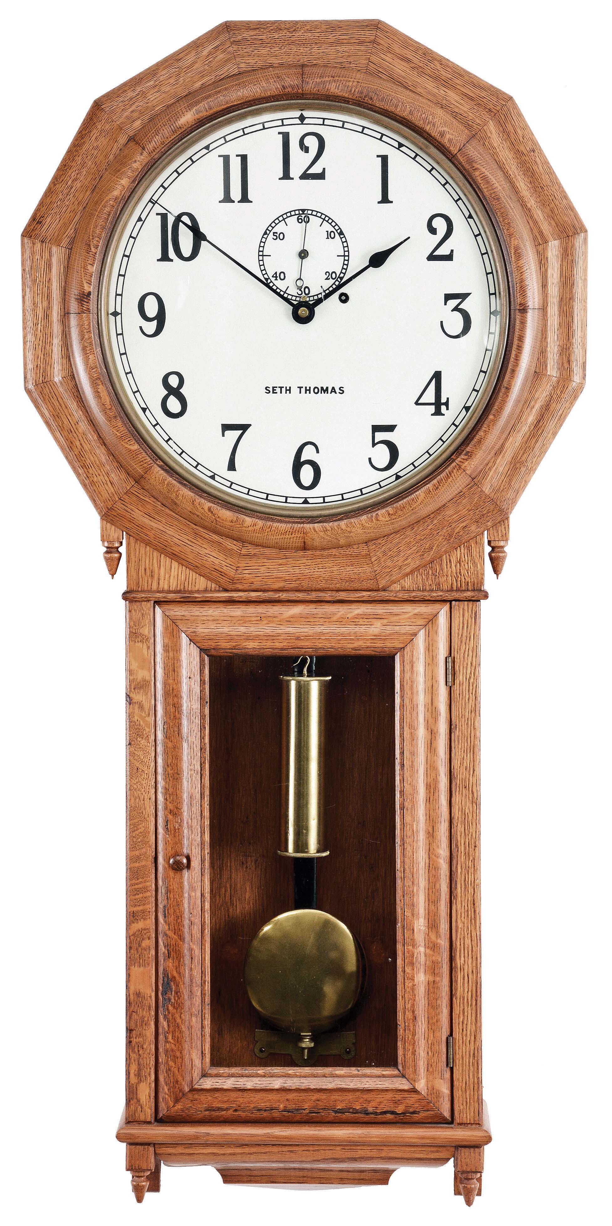 Seth Thomas Clock Co., Thomaston, Conn., "Regulator No. 3" wall hanging clock with a weight driven, 8 day, timepiece movement with a dead-beat escapement and maintaining power in an oak case. — Antique Clocks Price Guide