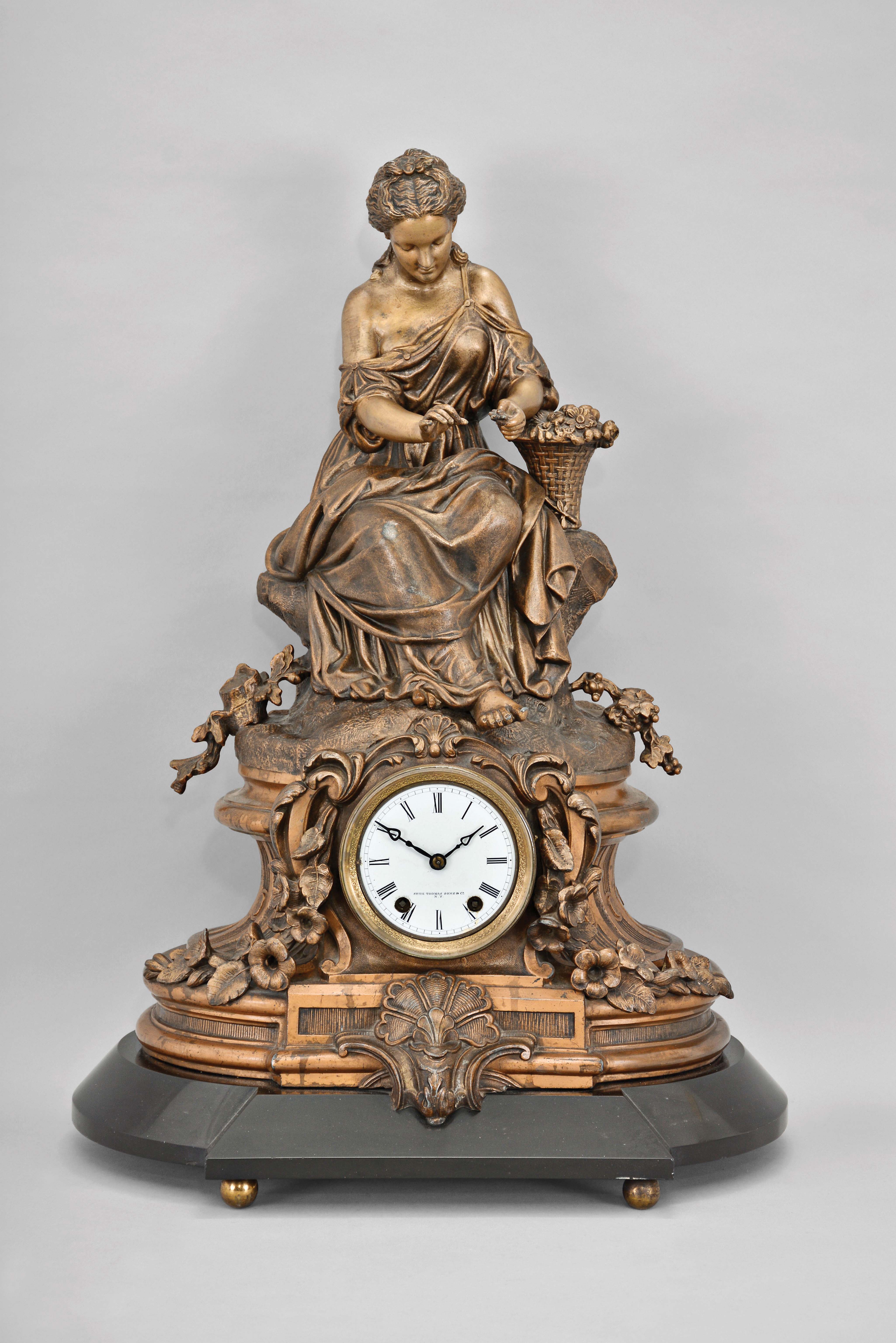 Seth Thomas Sons &amp; Co., New York, "8029" shelf clock with a spring driven 15 day time and half hour strike movement in a bronzed finish spelter case. — Antique Clocks Price Guide