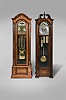 Tall Clocks- 2 (Two) mid 20th century, 8 day, time, strike and tubular chime, weight driven movement with moon phase in walnut and glass cases: (1) Emperor Clock Co., Amherst, VA, beveled glasses, 9 tubes, playing three tunes, Westminster, Whittington, St. Michael's; (2) Herschede Clock Co., Cincinnati OH, Westminster chime only
