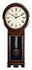 Seth Thomas Clock Co., Thomaston, Conn., "Regulator No. 2" wall clock with a weight driven, 8 day, timepiece movement with maintaining power in a walnut veneered case.