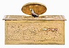 Germany, probably Karl Griesbaum, singing bird box, gilt brass case with ornate filigree applique, the front with slide for activating the bird, appearing from beneath the oval cover and performing on demand, 20th century