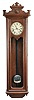 Large American wall clock with a double weight driven sweep second timepiece movement in a chestnut case.