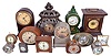 Clocks- 26 (Twenty-six) Desk and Novelty: many small clocks by makers including Westclox, Gubelin, Waterbury, Sprague & Co., Junghans, Seth Thomas, LeCoultre, Ansonia, Welch, Keebler, Imhof, Waltham, and others.