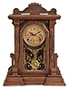 E. Ingraham & Co., Bristol, Conn., premium model made expressly for the Lovell Manufacturing Co., Philadelphia. This is a shelf clock with a spring driven, 8 day, time and strike movement with a simple calendar mechanism in a walnut case.