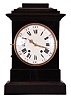 Switzerland, a large, ebonized, quarter striking and repeating bracket clock, stepped, molded base below a large, arabic and roman numeral enamel dial, molded cornice and stepped, molded top, pierced and engraved gilt hands, 8 day, two train movement with rectangular plates striking on two bells, and with verge escapement, silk thread suspension, and strike work mounted to the back plate