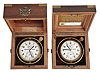 Chronometers- 2 (Two), both Zenith, two day, gilt, rim wind and set, 19 jewel movements, Arabic numeral silvered dials with blued steel hands, contained in lacquered brass bowls and gimbals, with mahogany two tier boxes, one with glazed top, and one with original rate certificate
