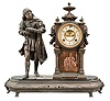 Ansonia Clock Co., New York, "Faust" figure shelf clock with a spring driven, 8 day, time and half hour strike movement with visible escapement in an enameled iron base with one Japanese bronze spelter statue.