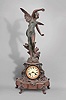 Ansonia Clock Co., New York, "Oceanic (base) and LaSource (figure) " shelf clock with a spring driven, 8 day, time and half hour strike movement in a bronze finished spelter case..