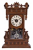 Seth Thomas Clock Co., Thomaston, Conn., "Beloit" shelf clock with a spring driven, 8 day, time, strike and alarm movement in a walnut case.