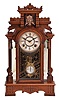 F. Kroeber Clock Co., New York, "Artic" shelf clock with a spring driven, 8 day, time and strike movement in a walnut case.