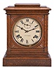 Seth Thomas Clock Co., Thomaston, Conn., "Hotel" shelf clock with a spring driven, 8 day, time and strike movement with cathedral gong in an old oak case.