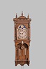 Seth Thomas Clock Co., Thomaston, Conn., "Jupiter" hanging, 8 day, time and bell strike weight driven movement in an open well oak case with three Jenny Lind busts and pressed brass ornaments, silvered metal dial with moon phase