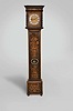 Joseph Knibb, London, a late 17th century, two train tall clock with associated case, the 8 day, six pillar time and strike movement with riveted latches, bolt and shutter maintaining power, count wheel striking, and recoil escapement, 9 1/2" square brass dial with matted center, roman numeral silvered chapter ring, date aperture above 6:00, cherub spandrels, and signed "Joseph Knibb Londini Fecit", finely finished, fretted, blued steel hands, the oak case in the manner of Jasper Braem, with ebonized moldings and ball feet, oyster veneers, marquetry panels with gadrooned urns issuing flowers and foliage, and with perching birds, flat top bonnet with ebonized Solomonic columns, glazed sides, and marquetry frieze, with brass clad pendulum, brass cased weights, brass pulleys, and correct winding key