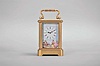 France, a mignonette No.1 carriage clock, glazed, gilt Corniche case, roman numeral, polychrome enamel dial depicting a young couple in a landscape, fancy gilt hands, 8 day, timepiece movement with lever platform, the back plate marked "A.B. Depose", and inside of front plate with letter B within a circle