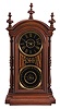 National Calendar Clock Co., "Fashion" shelf clock with a spring driven, 8 day, time and half hour strike movement by New Haven Clock Co., with black dials and a simple calendar mechanism in a walnut case.