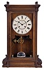 Seth Thomas Clock Co., Thomaston, Conn., "Lincoln V.P." shelf clock with a weight driven, 8 day, time and strike movement with cathedral gong in a walnut case.