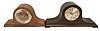 Clocks- 4 (Four) Time and Strike Mantel: (1) Seth Thomas Clock Co., tambour clock, 8 day, time and strike with Westminster chime, spring-driven No. 124 movement in a mahogaNew York case with silvered dial. (2) GermaNew York, tambour clock, 8 day, time and strike, spring-driven movement in an oak case with silvered chapter ring. (3) Ansonia Clock Co., New York, "Marbleite No. 2" mantel clock, 8 day, time and strike, spring-driven movement with visible escapement in a hard rubber case meant to simulate wood. (4) Ansonia Clock Co., New York, "La Lorne" mantel clock, 8 day, time and strike, spring-driven movement in a blue Royal Bonn porcelain case with floral motif.