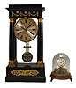 Clocks- 2 (Two) Unusual Mantel: (1) France, Empire portico clock, long duration, time and bell strike, spring-driven movement with pinwheel escapement, vernier beat adjustment, and center seconds in a four-column ebonized case with applied gilt ornaments, silvered dial, and blued steel hands, c1830. (2) GermaNew York, Horolovar / Clocktrade Enterprises, Bronxville, New York, reproduction Briggs rotary timepiece, 8 day, time only, spring-driven movement with conical pendulum on a turned wood base with brass feet, all under a glass dome, number 957 of 2000, c1975.