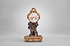 French, J.E.D., Paris, 8 day, time and strike, spring driven brass movement figural mantel clock with white enamel dial reading "Festeau le Jeune Hger du Roy / Paris".