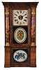 Seth Thomas Clock Co., Thomaston, Conn., "Shell Column" shelf clock with a weight driven, 8 day, time and strike lyre movement in a mahogany case with gilt capped faux tortoise shell columns.