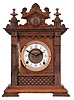 Ansonia Clock Co., New York, "Salem" cabinet shelf clock with a spring driven, 8 day, time and half hour strike movement in an oak case.