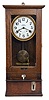 Simplex Time Recorder Co., Gardner, Mass., "Time Recorder Model 12", 8 day, time and card stamp, twin spring driven movement in an oak case with painted metal dial.