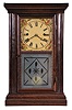 Forestville Mfg. Co., (J.C. Brown), Bristol, Conn., 8 day, time and strike, spring fusee brass movement small cornice top shelf clock with rippled molding on the door.