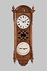 Seth Thomas Clock Co., Thomaston, Conn., "Office Calendar No. 10" hanging clock with a weight driven, 8 day, timepiece movement and a R. T. Andrews patented perpetual calendar mechanism in an oak case with burl walnut accents.