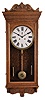 Sessions Clock Co., Forestville, Conn., "Regulator No. 5" wall hanging clock with an 8 day weight driven brass timepiece movement in a sold oak case.